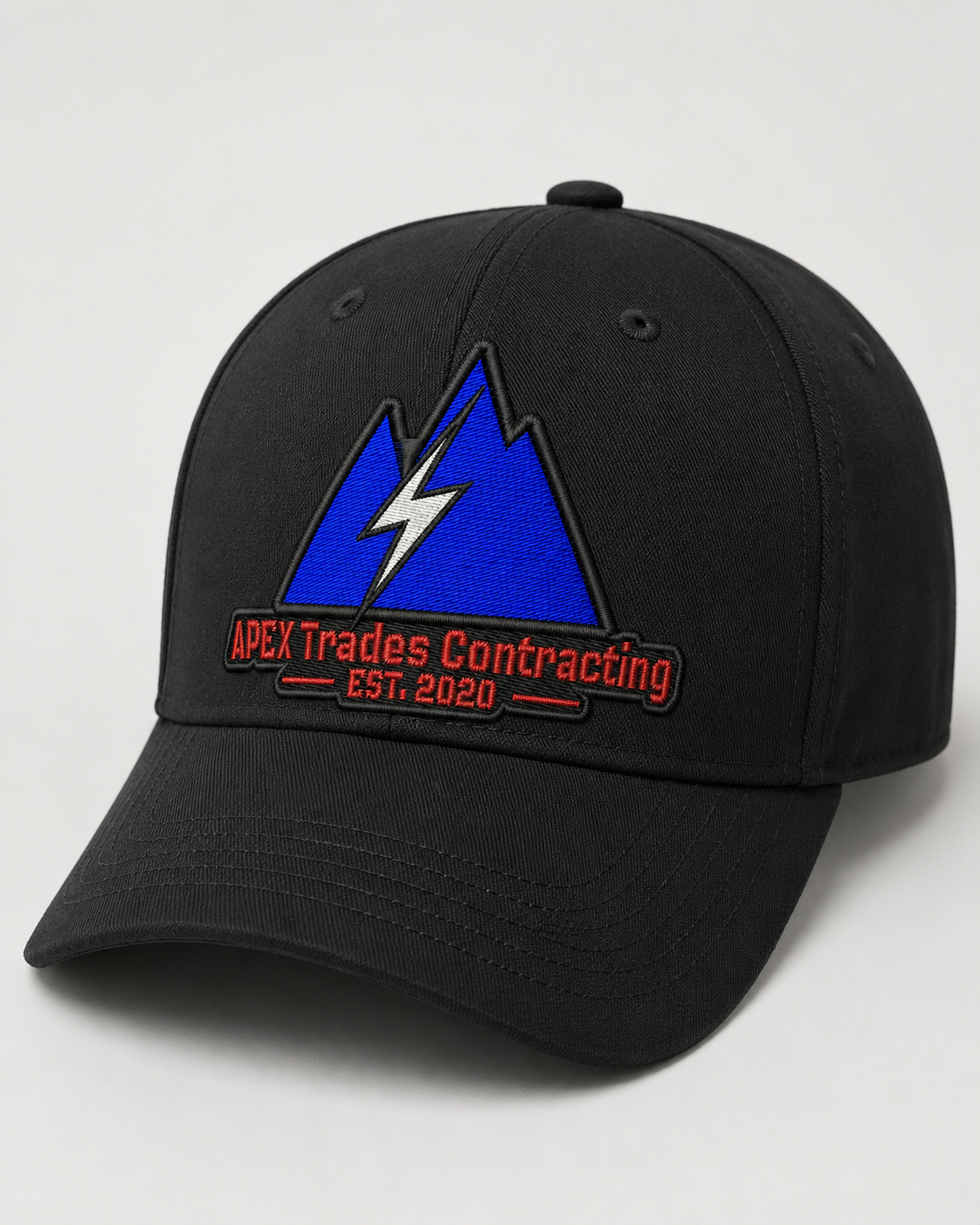 Custom embroidered black cap with Apex Trades Contracting logo